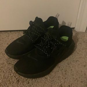 Nike presto react ‘black cat’ size 10. Reflective laces and pull tab.
